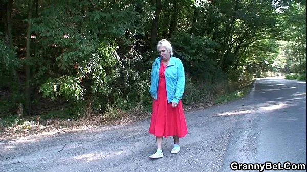 XXX He picks up and bangs 80 years old granny outside toplo tube