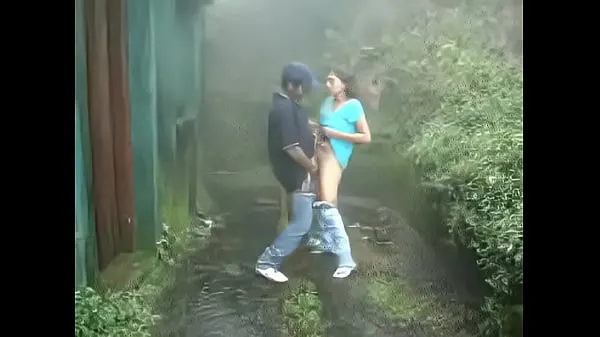 XXX Indian girl sucking and fucking outdoors in rain meleg cső