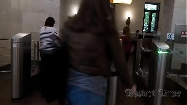 XXX Upskirt of a slender girl on an escalator in the subway warm Tube