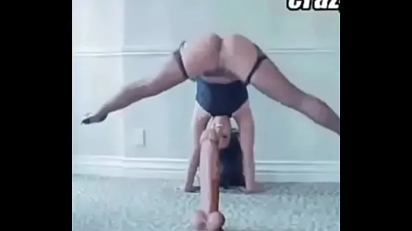 XXX Naughty acrobat sitting on giant stick. Woman with stunning precision in pussy گرم ٹیوب