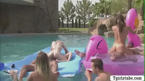 XXX Busty shemales are in the swimming pool with many guys that,they decide to do orgy and they start kissing each is,they suck their big cocks passionately and they let them bareback their wet ass too warm Tube