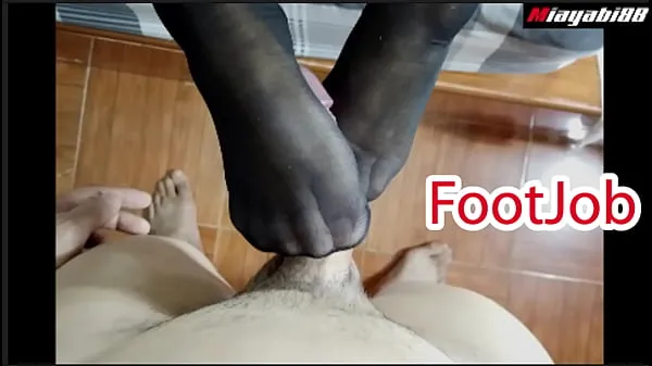 XXX Thai couple has foot sex wearing stockings Use your feet to jerk your husband until he cums ciepła rurka